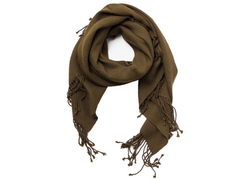 Handwoven alpaca scarf in earthy moss green, featuring soft texture and twisted fringe ends, styled in a looped wrap against a white background.